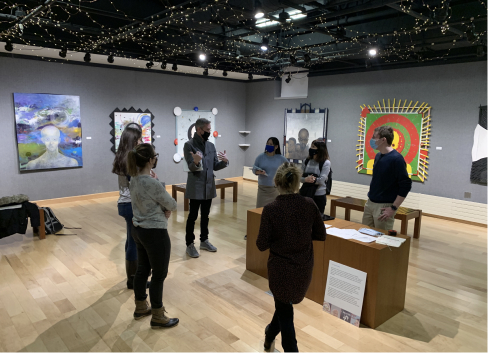 students standing in gallery